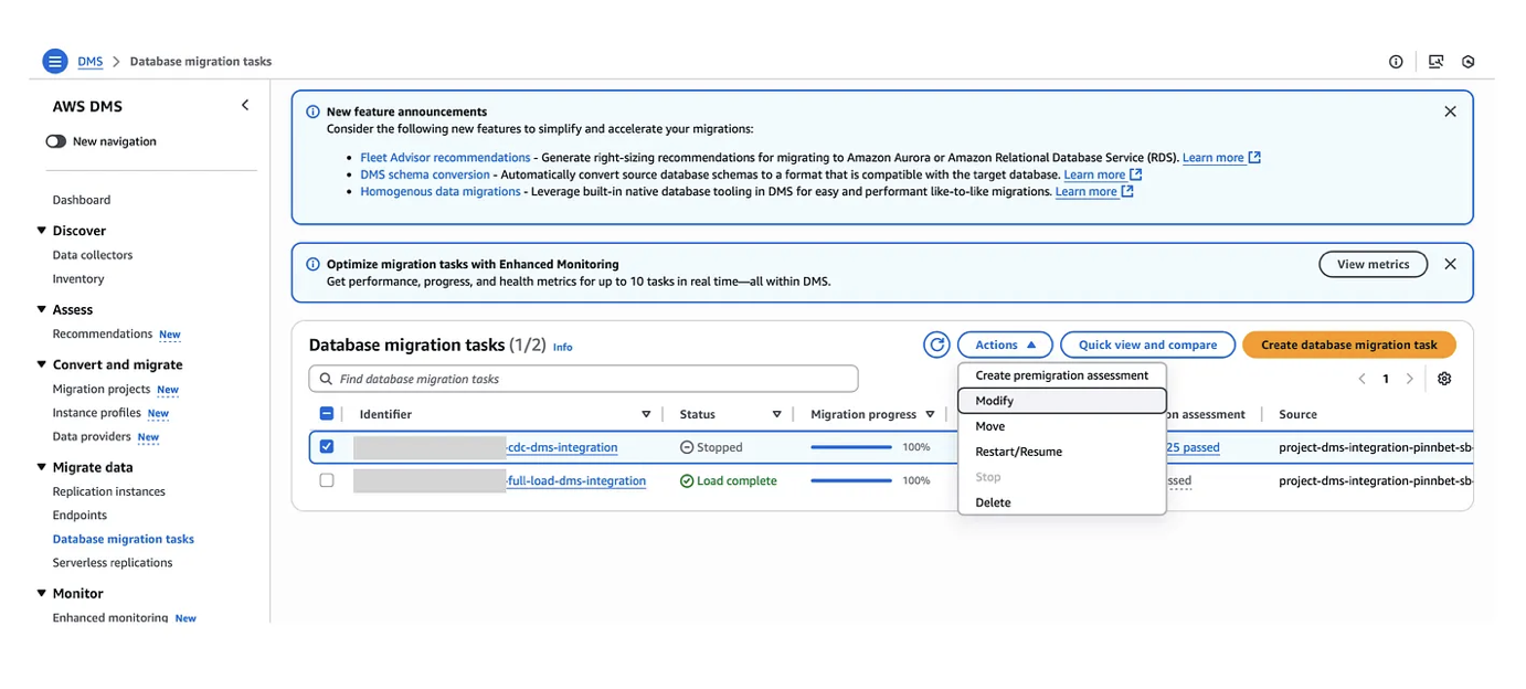 DMS console — task in Stopped state, opening Modify